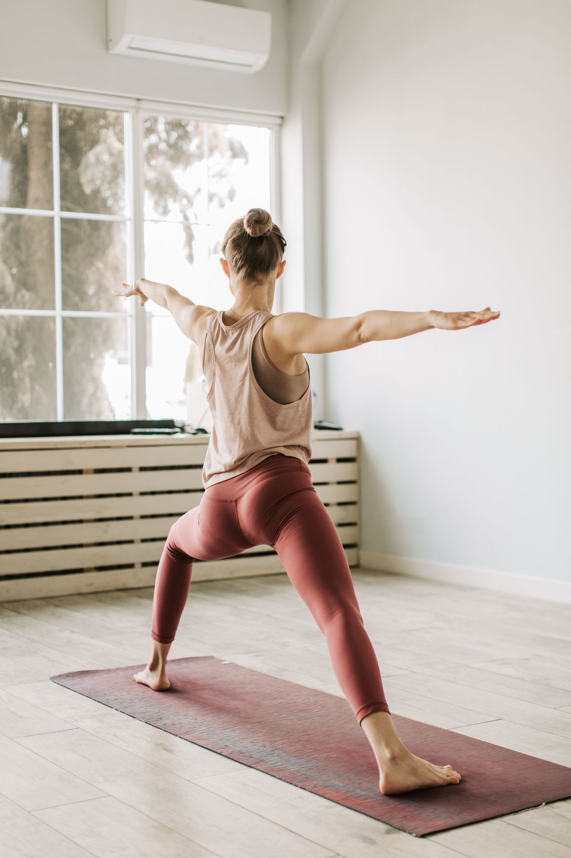 Woman in Warrior II pose